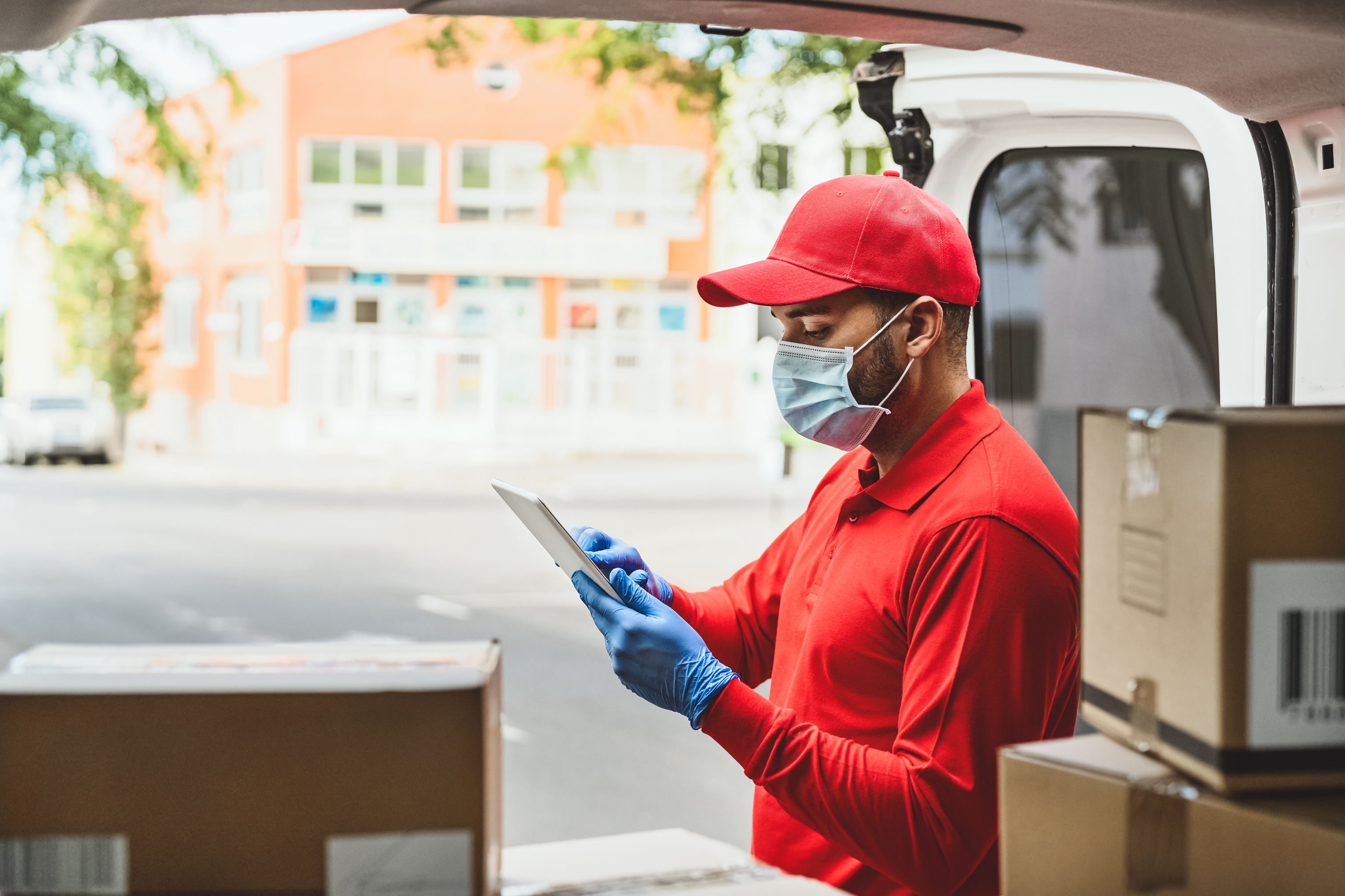 Delivery man wearing face protective mask